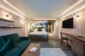 Modern hotel room with forest wall art, king bed, green sofa, TV, and wooden decor