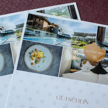 Wellness hotel voucher with collage of spa, gourmet dish, and cozy bedroom