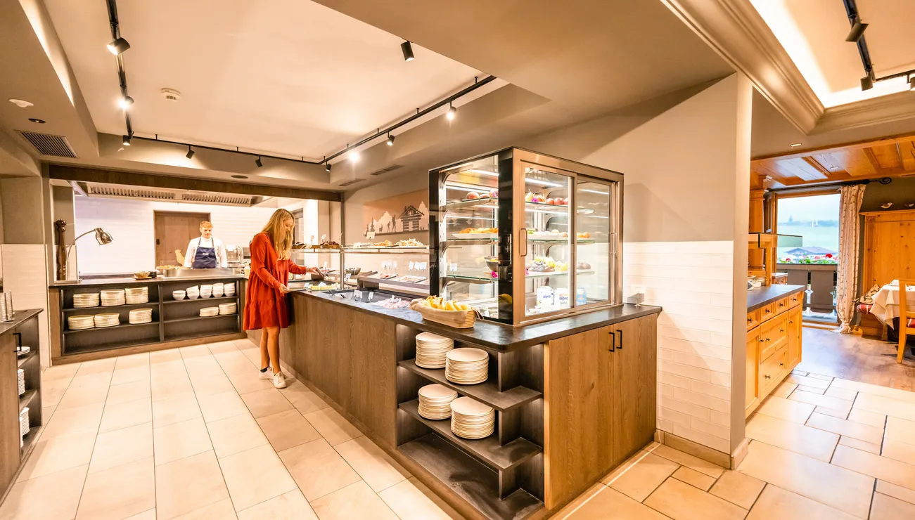 Hotel breakfast buffet with modern interior and fresh food display